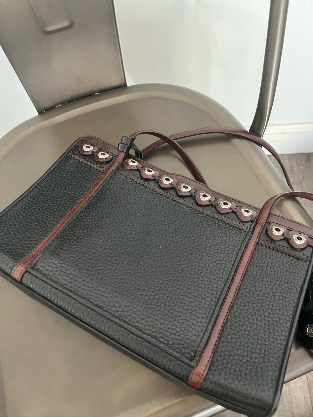 Brighton Black Shoulder Bag with Brown Trim and Metal Eyelets